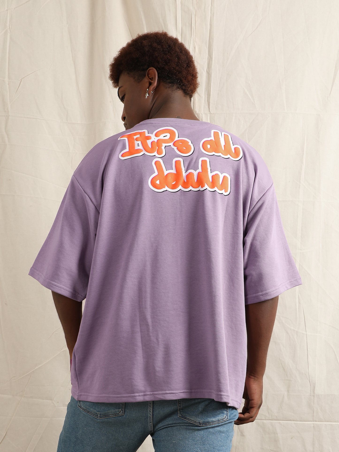 IT’S ALL DELULU T-SHIRT (LILAC)