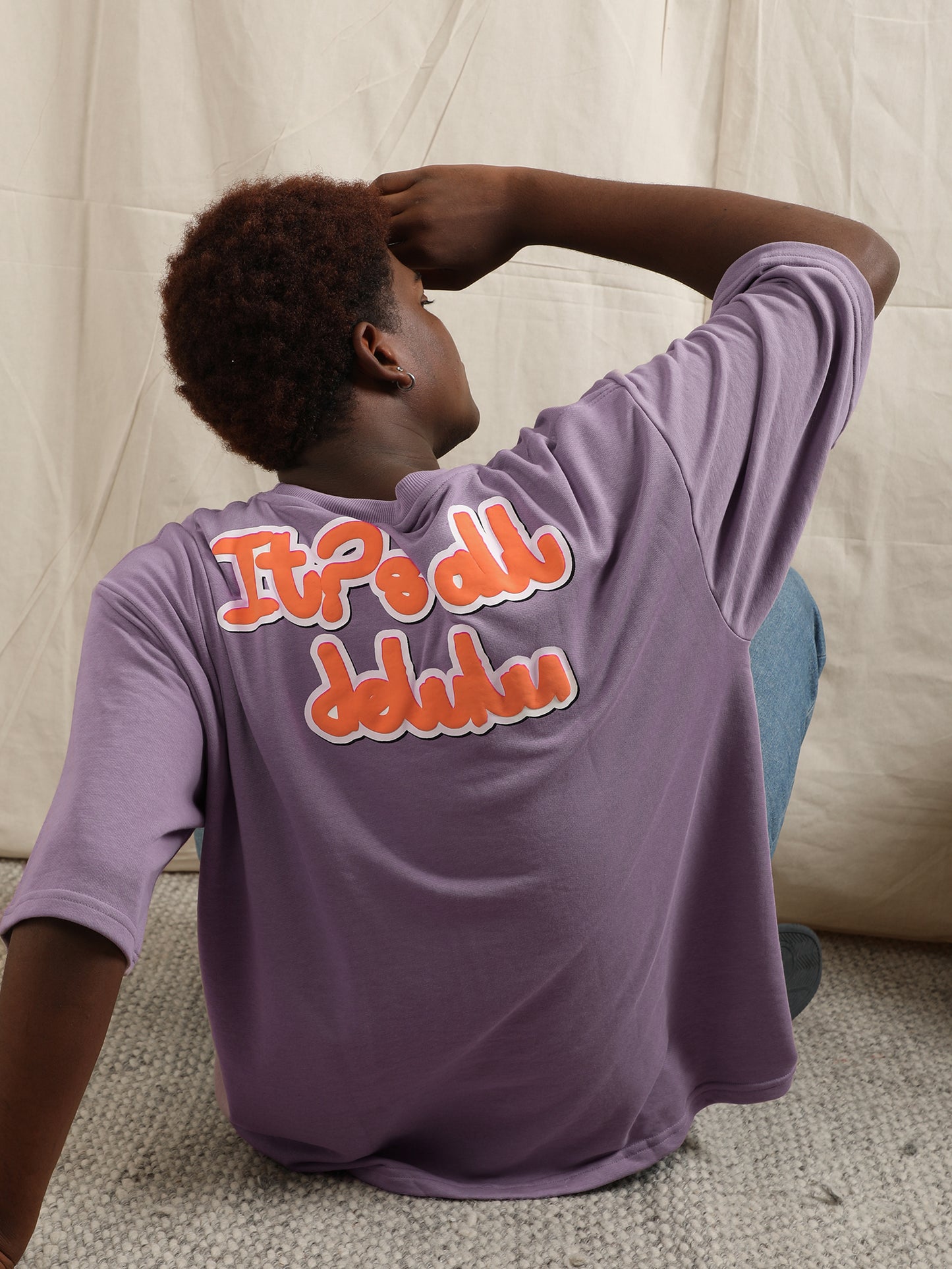 IT’S ALL DELULU T-SHIRT (LILAC)